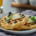 blueberry waffles with mint garnish
